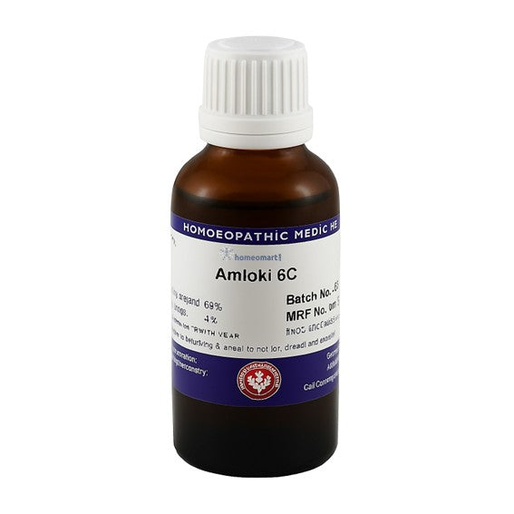 Bottle of Amioki 6C homeopathic medicine on a white background