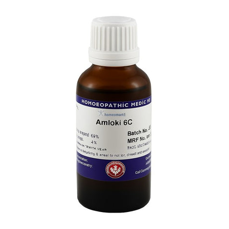 Bottle of Amioki 6C homeopathic medicine on a white background