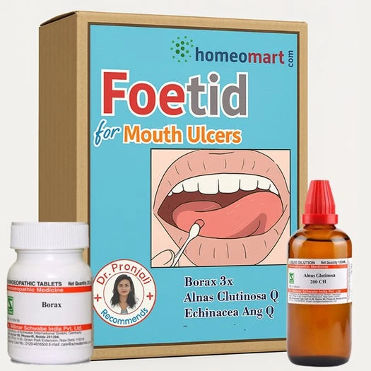 Homeopathic treatment for mouth ulcers including a box, bottle, and tablets.