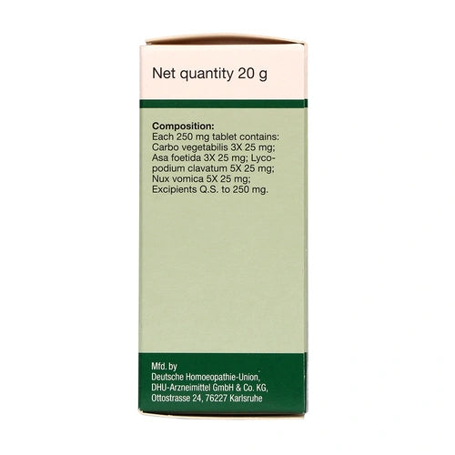 Box of medication with green label on a white background