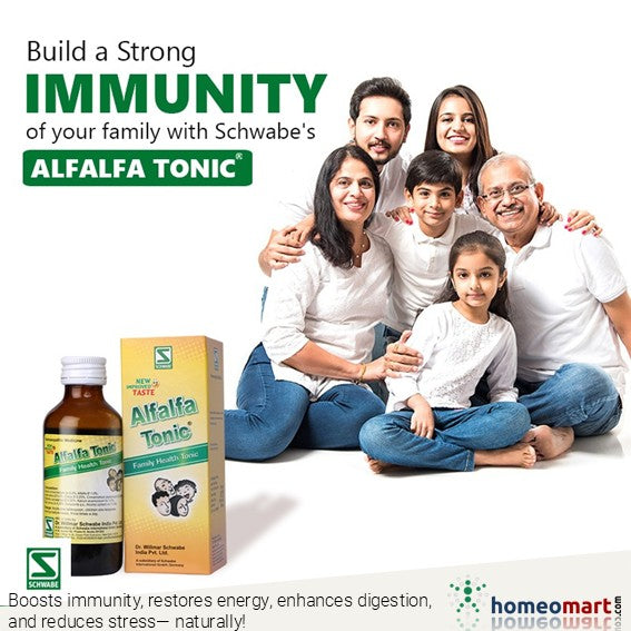 Indian Family with Schwabe's Alfalfa Tonic on a white background