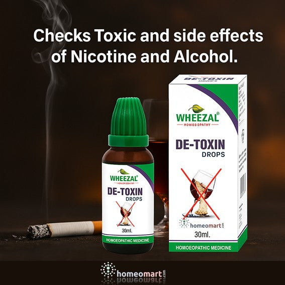 Wheezel De-Toxin drops with packaging and smoking materials on a dark background