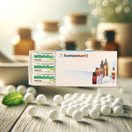 Millefolium homeopathic products with bottles and pills on a wooden surface