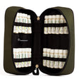 Green travel medical case with compartments filled with white bottles labeled 'homeomart'.