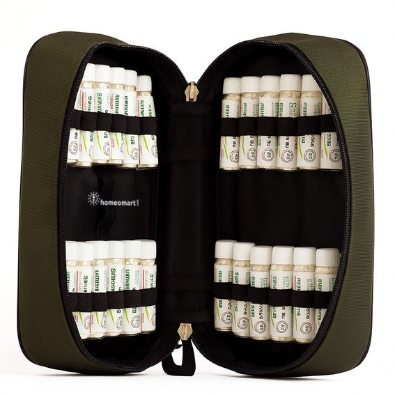 Green travel medical case with compartments filled with white bottles labeled 'homeomart'.