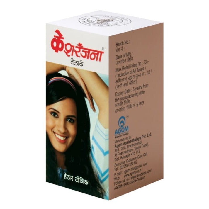Box of Agom Kesharanjana Hair Oil with an image of a woman on the front, indicating the product is for hair fall and graying.