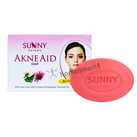 Packaging of Bakson Akne Aid Soap with Tea Tree Oil, showing the product and its herbal ingredients such as echinacea, witch hazel, and aloe vera, with the brand logo 'Sunny Herbals'.