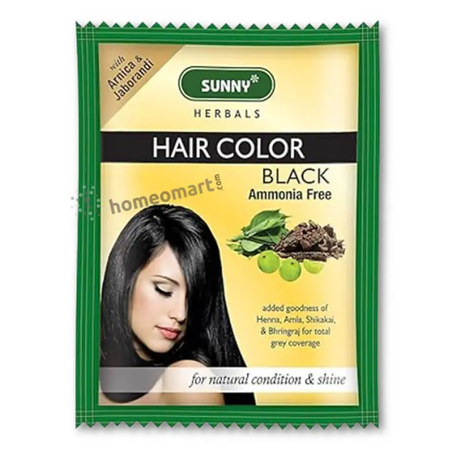 Packaging of Bakson Sunny Herbal Hair Color in Black color with the brand logo and images of herbs. The packaging also highlights that it is enriched with goodness of Arnica, Henna, Shikakai for local and global coverage.