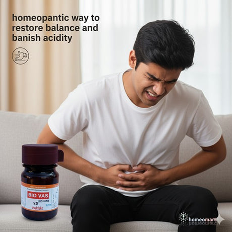 Man experiencing acidity and gas trouble with a bottle of BIO VAS acidity tablets on a couch.