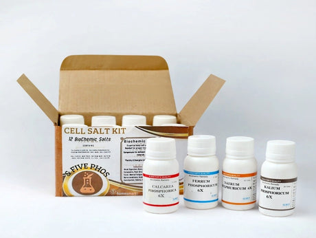 Cell salt kit with bottles and a cardboard box on a white background