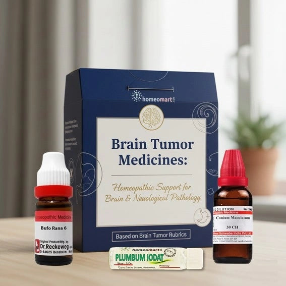 Homeopathic brain tumor medicines with packaging on a wooden surface.