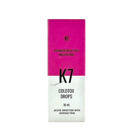A box of King & Co Coldtox Drops K7, which is a homeopathic medicine for cold, flu, and septic symptoms. The packaging is primarily pink and white with text and a brand logo.