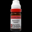 Bottle of Dr. Reckeweg Ammonium Caust Q homeopathic medicine on a white background