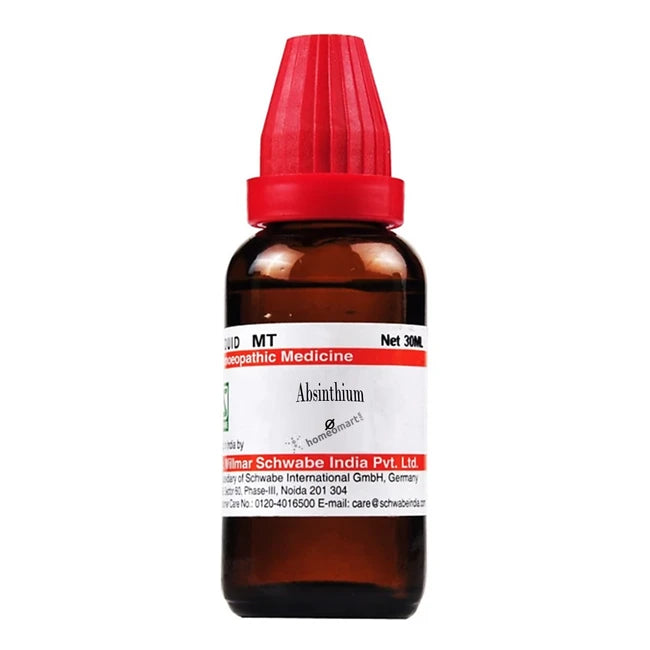 Bottle of Absinthium medicine with a red cap on a white background