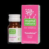 Mama Natura Tussikind homeopathic medicine bottle and packaging on a black background