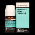 Phytolacca Berry Tablets N bottle and packaging on a black background