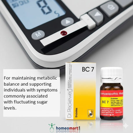 Glucose meter with Dr. Reckeweg BC 7 homeopathic medicine packaging and bottle on a white background.