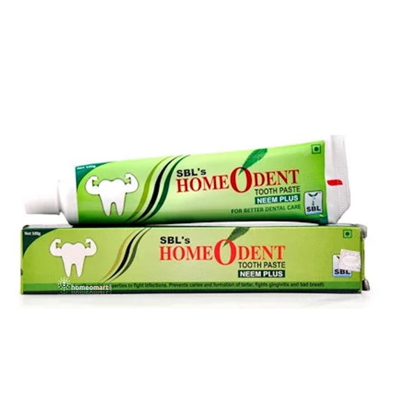Two tubes of SBL's Homeodent Tooth Paste on a white background