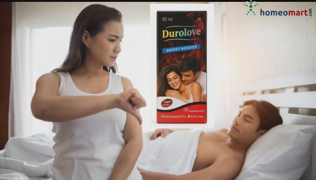 a 5 second video of woman giving a thumbs down to man in bed with durolove passion ignitor product