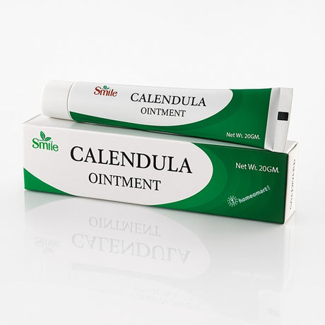 Calendula ointment packaging with green and white design on a white background