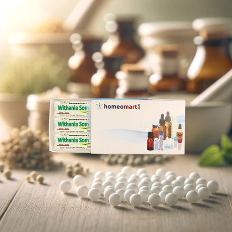 Homeopathy products including withania pills, tablets, and bottles on a wooden surface with a blurred background.