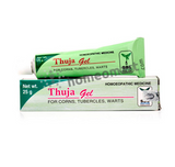 Two boxes of SBL Thuja Gel, one standing upright and the other lying down, with packaging that includes the product name and a description of it being a homeopathic medicine for warts, corns, and tubercles.